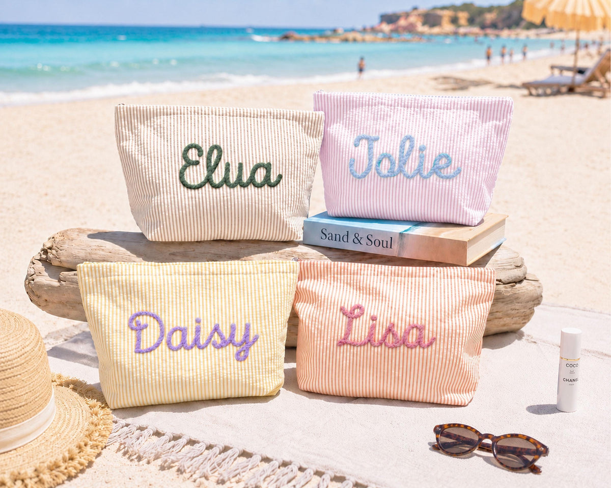 Personalized embroidered seersucker makeup bag gift set at the beach