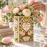 Love Story wedding book vase displayed with romantic pink flowers
