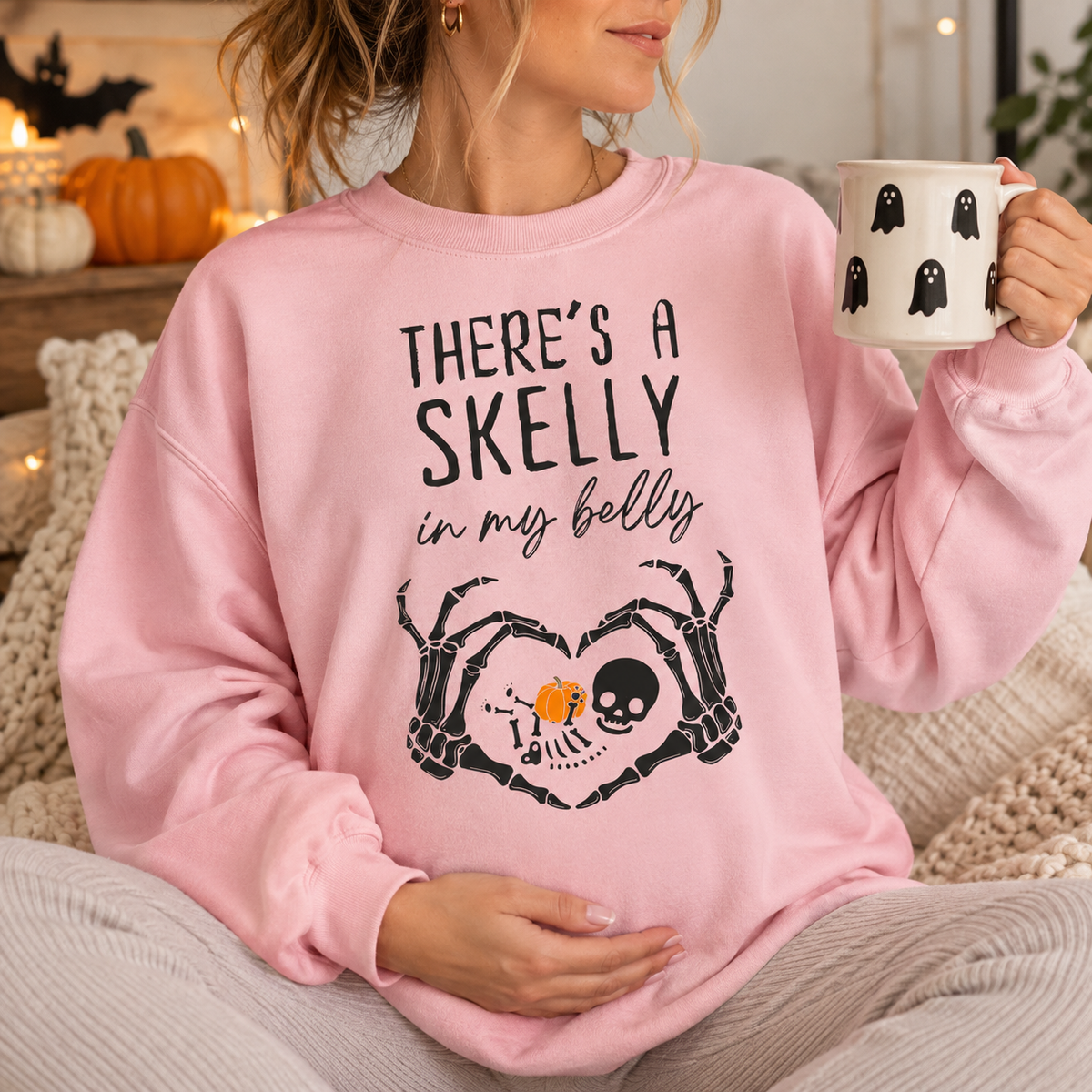 There's a Skelly in My Belly maternity sweatshirt and hoodie mockup 9