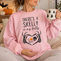 There's a Skelly in My Belly maternity sweatshirt and hoodie mockup 9
