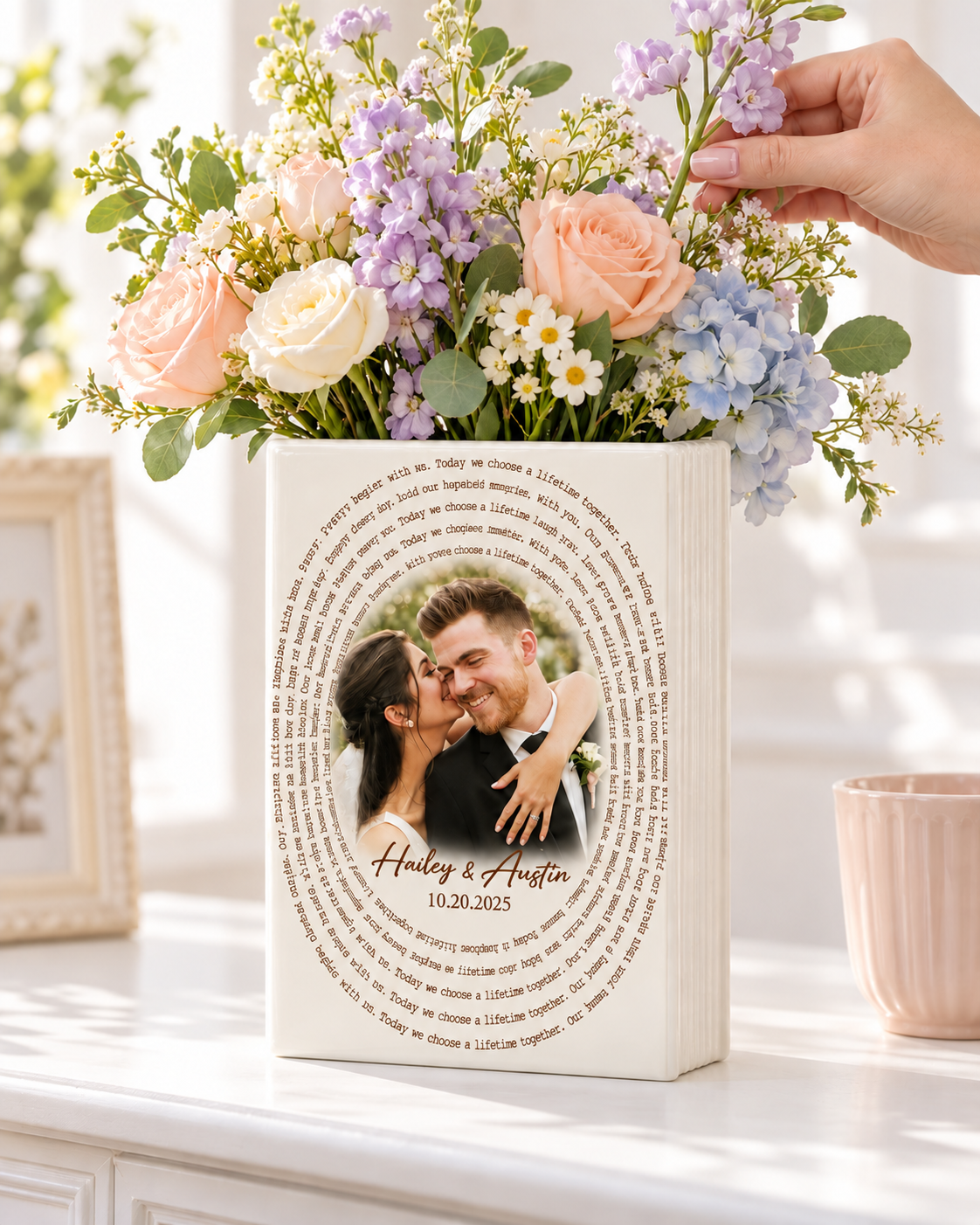 Wedding Vows ceramic book vase displayed with flowers
