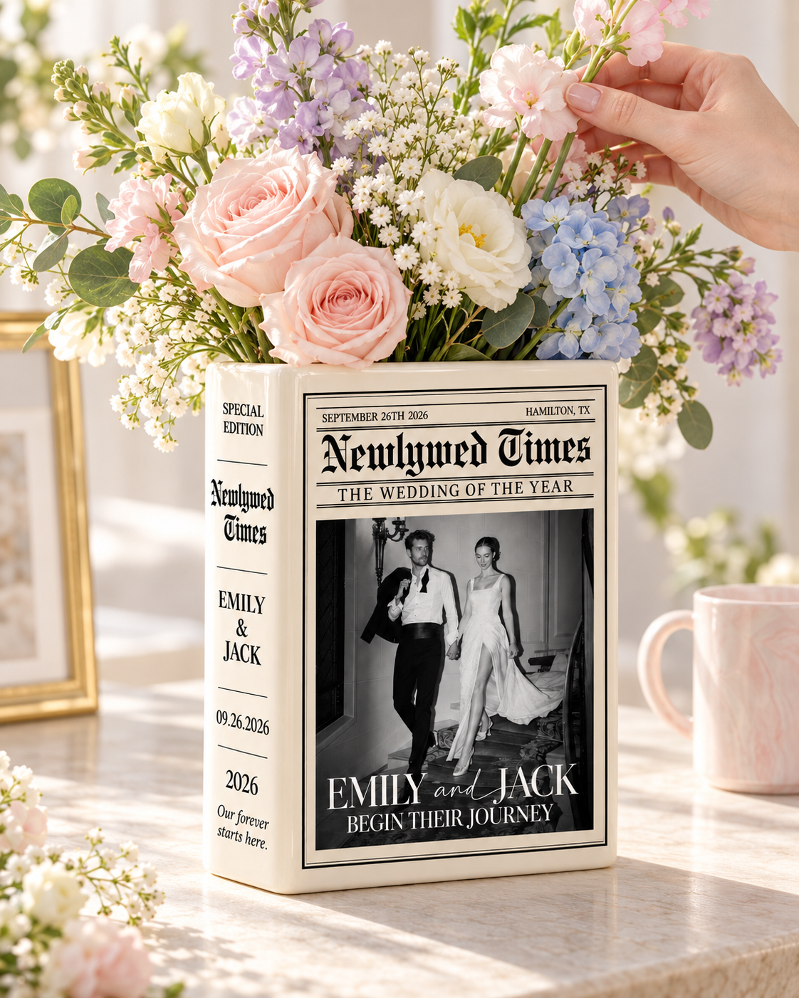 Newlywed Times ceramic book vase with pastel wedding flowers