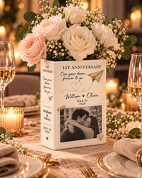 First anniversary ceramic book vase centerpiece at a romantic dinner