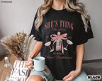 Coquette Bow Bachelorette Party Shirts, Bachelorette Party Shirts, She's Tying the Knot Shirt, Custom Bride Shirt, Bridal Party Shirts