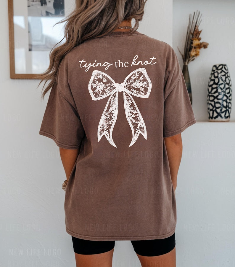 Shes Tying the Knot Bride Comfort Colors Shirt Coquette Bridal Shower Bow Engagement Party Future Mrs Gift Bride Getting Ready Shirt Custom