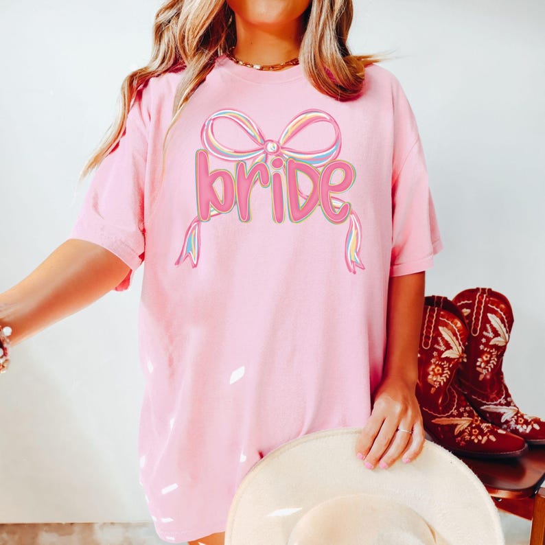 Bride Preppy Coquette Pink Bow Shirt, She's Tying the Knot, New Bride Tee, Bachelorette Party Shirt, Just Engaged Shirt