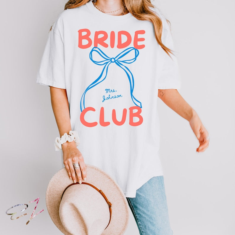 Custom Bride Shirt Coquette Bow Personalized Mrs Name Bridal Shower Gift Bride Tee Wedding Day Getting Ready Bachelorette Tees