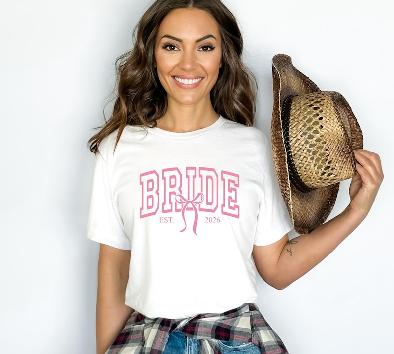 Pink Bride Est 2026 Varsity Shirt, Coquette Bow Bridal Tee